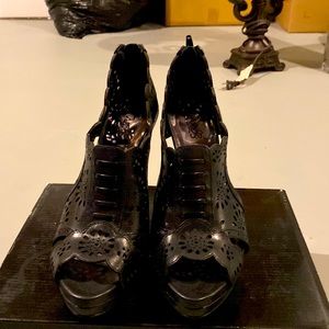 Carlos Santana Heel 8.5